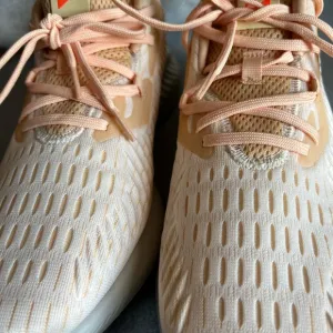 adidas Women’s Athletic Shoes in Cream and Orange