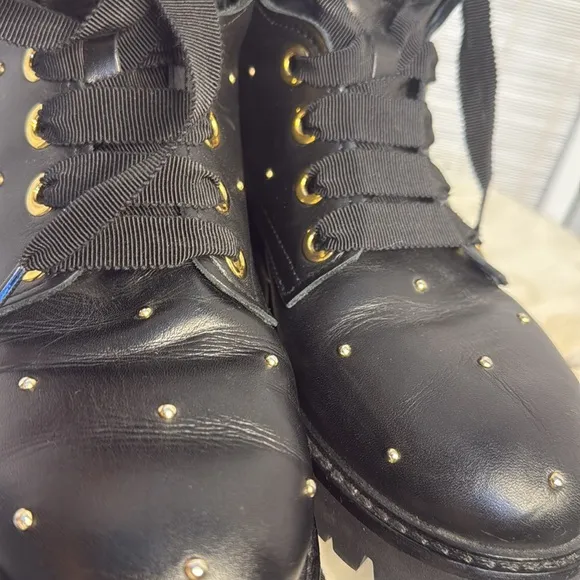 AGL studded black gold combat lug ankle boots