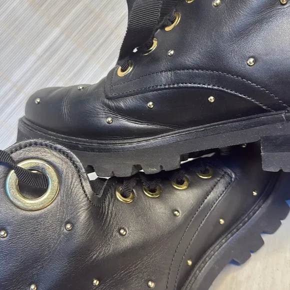 AGL studded black gold combat lug ankle boots
