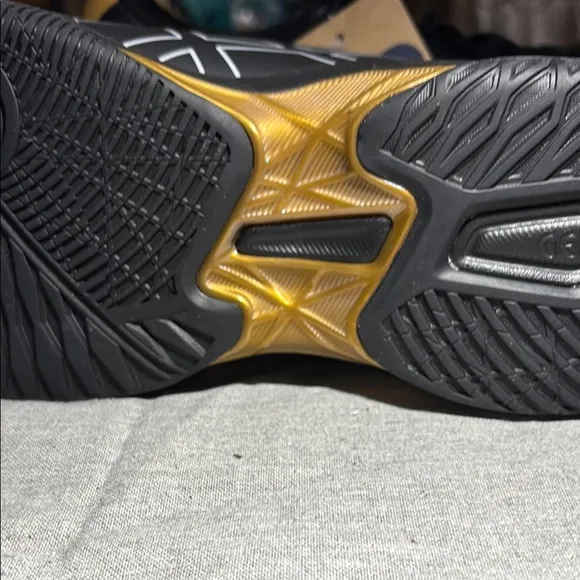 Asics Gel-Rocket 11 Black and Gold Athletic Shoes
