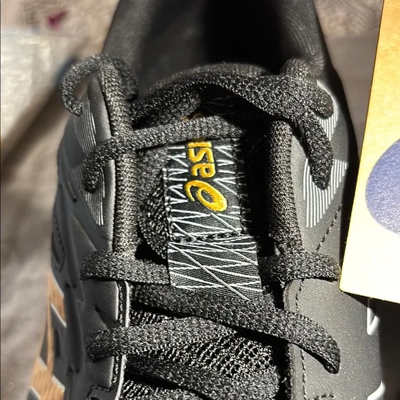 Asics Gel-Rocket 11 Black and Gold Athletic Shoes