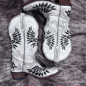 Black and White Heeled Boots with Intricate Stitching