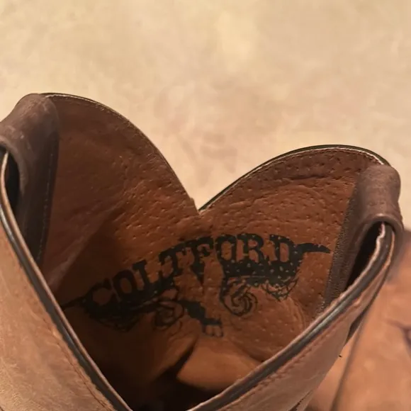 Brown Heeled Boots with Distressed Leather and Harness Details