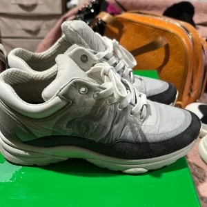 CHANEL White and Black Athletic Shoes