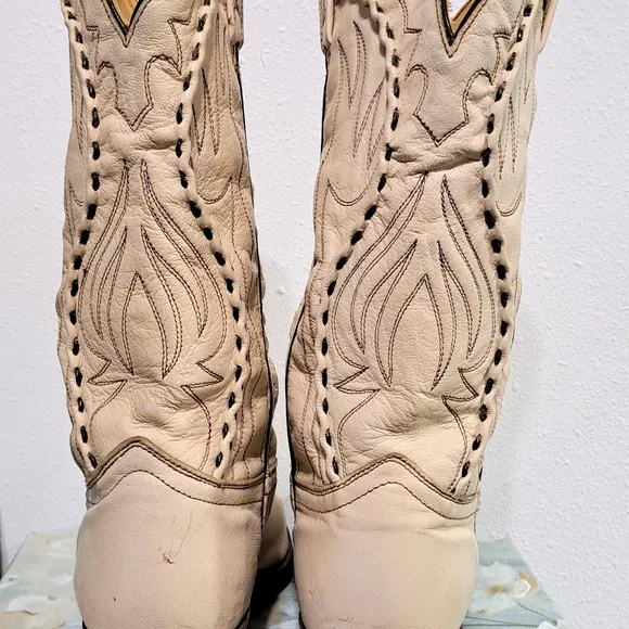 Cream Cowboy Boots with Intricate Stitching and Angled Heel