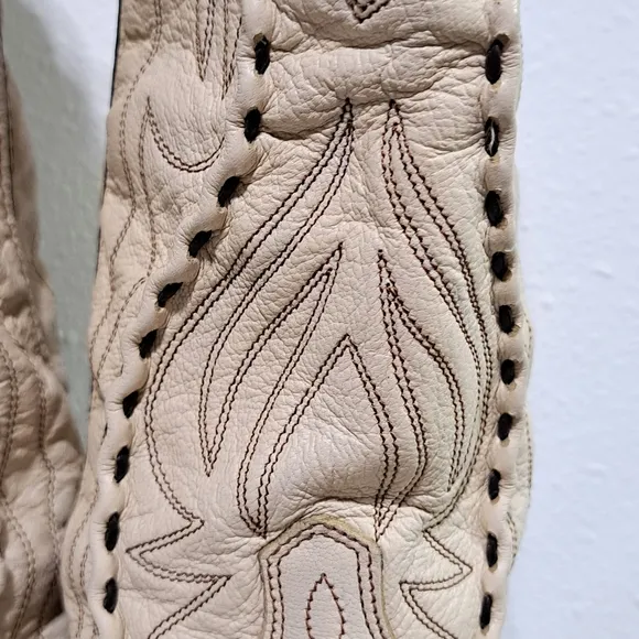 Cream Cowboy Boots with Intricate Stitching and Angled Heel