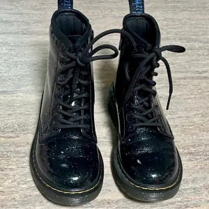 Dr. Martens 1460J glitter celestial ankle combat boots