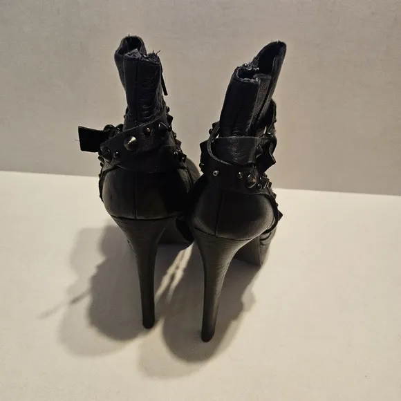Fergie Black Heeled Boots with Decorative Straps