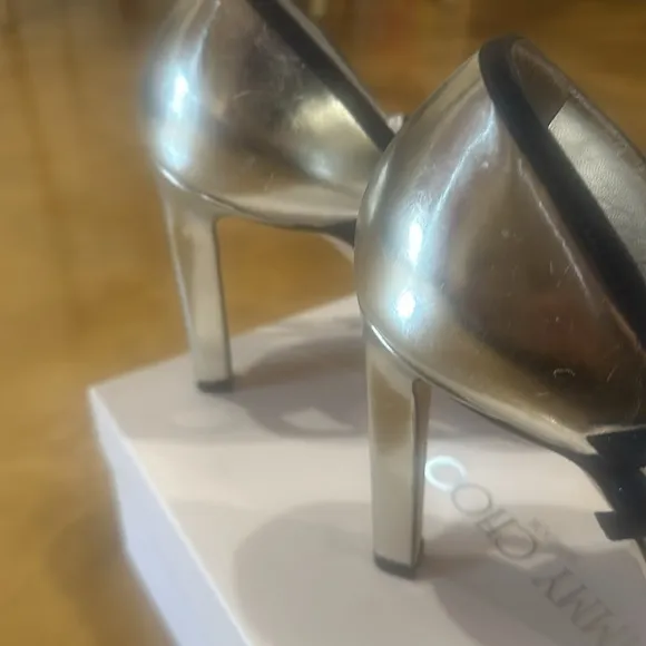 Jimmy Choo stunning silver with black bands, never worn.
