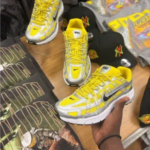 Nike Kids Yellow and Silver Sneakers