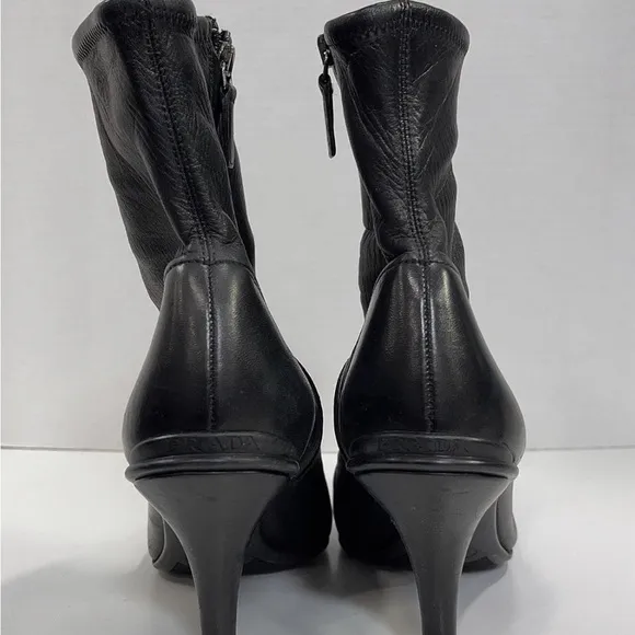 Sleek Black Heeled Boots with Side Zipper
