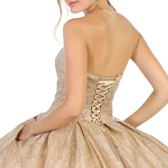 Strapless champagne glitter lace up back ball gown