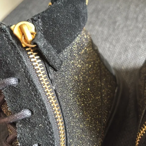 Stylish Black and Gold High-Top Sneakers