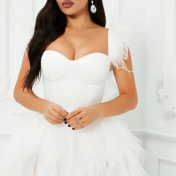 T length wedding dress. White feather tulle bridal gown