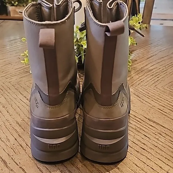 The UGG Lug sneakers boots size 7 NWOT moss green