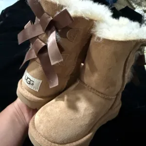 UGG Tan and Brown Boots with Satin Bows