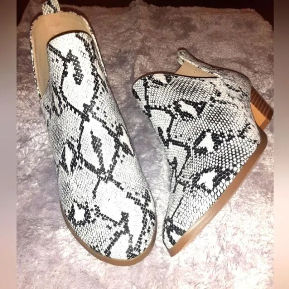 WOMEN'S cut-out ankle boots sz, 8,and 10